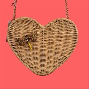 LC Laura Conrad woven heart shaped purse with golden dragon fly accent.